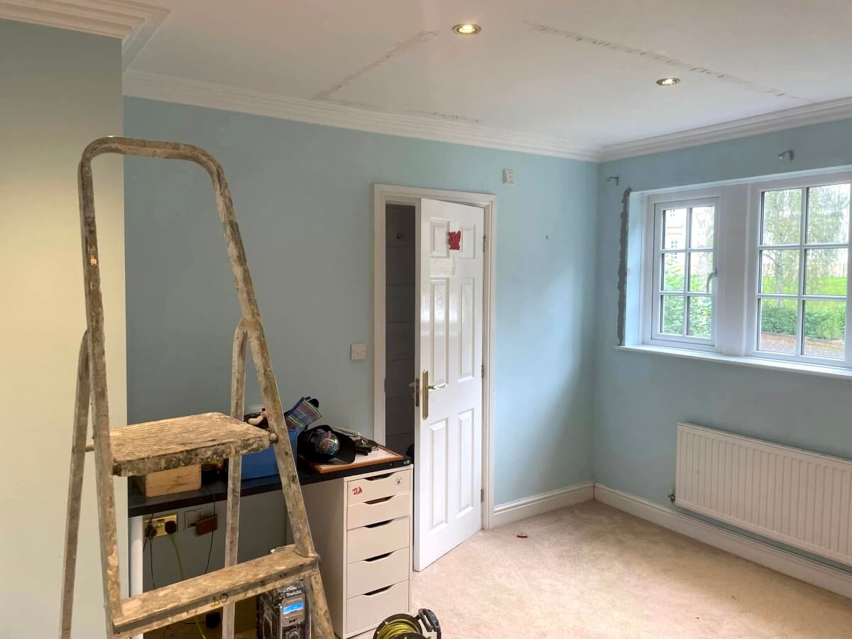 bedroom-blue-painted-walls-ladder-preparation-cardiff-primrose-decor Bedroom with pale blue painted walls and a decorator's stepladder in Cardiff