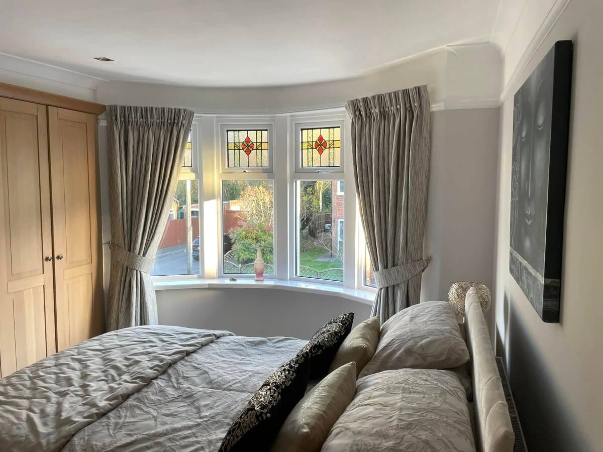 bedroom-grey-painted-walls-bay-window-stained-glass-cardiff-primrose-decor Bedroom with grey painted walls and bay window in Cardiff by Primrose Decor