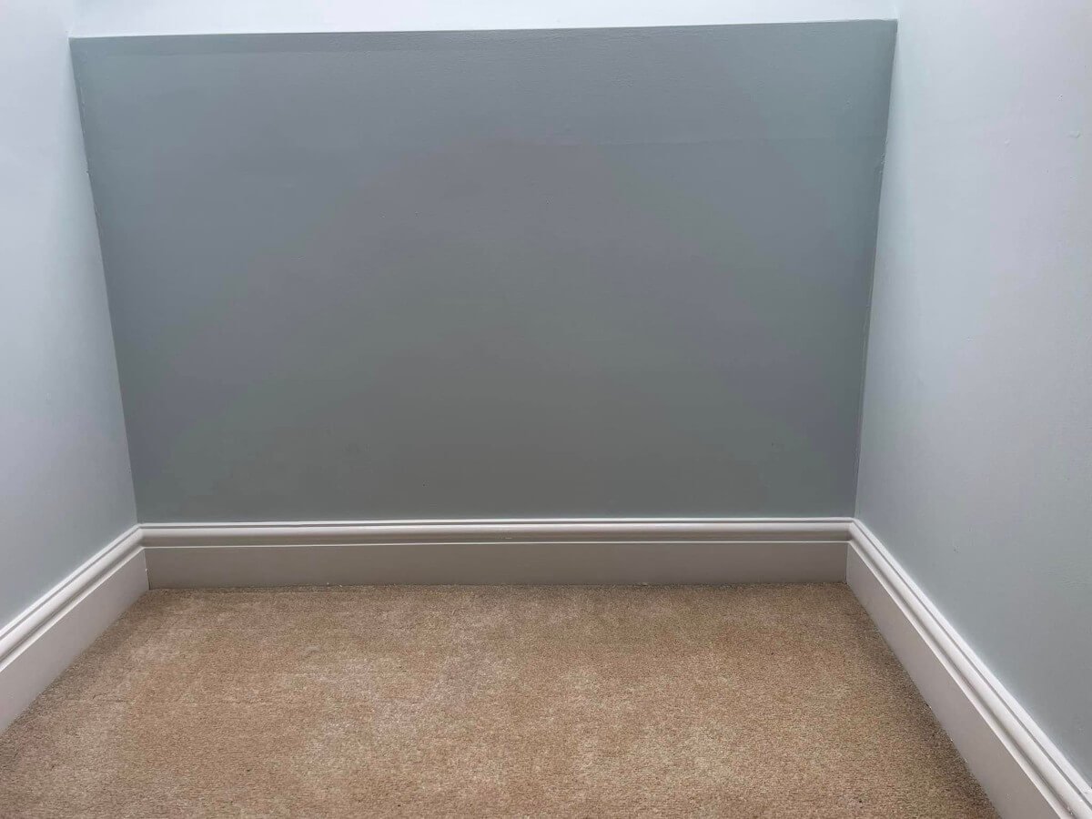 bedroom-grey-painted-walls-feature-wall-empty-cardiff-primrose-decor Grey painted bedroom walls with feature wall in a Cardiff apartment by Primrose Decor