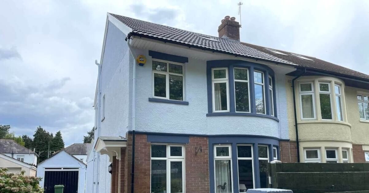 Window frame painting in Cardiff by Primrose Decor, house exterior with painted frames and walls